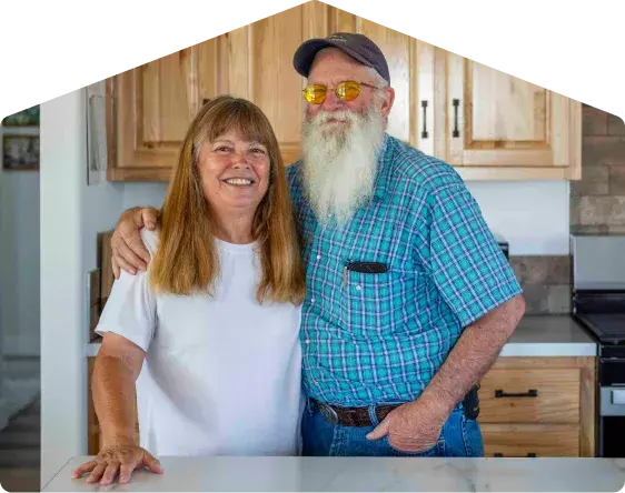 A couple in the kitchen of their manufactured home